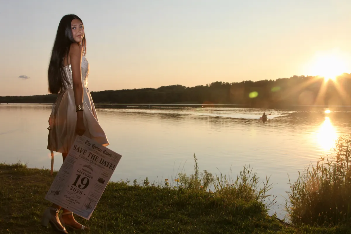 Celeste by the lake at sunset.