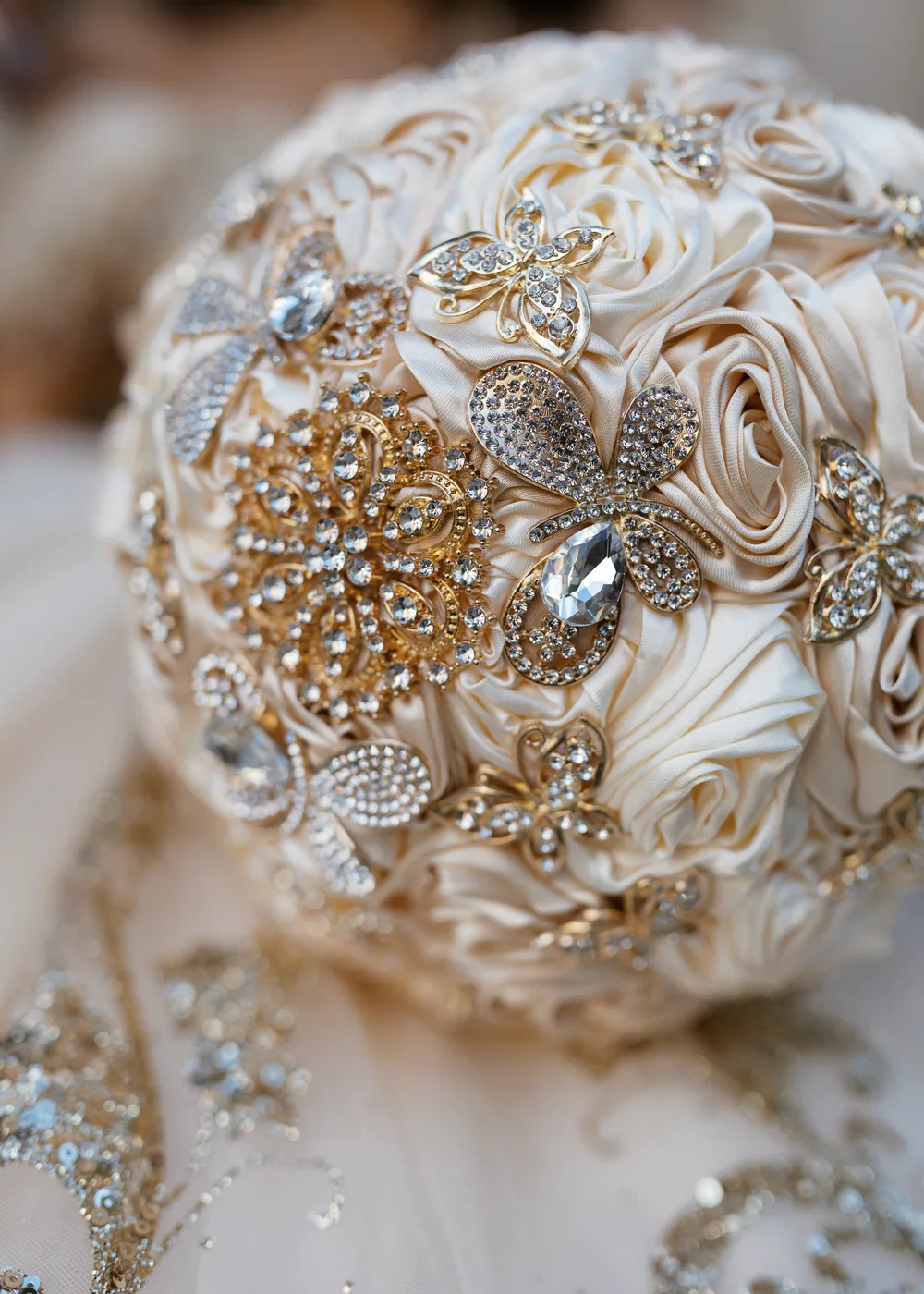 Celeste’s bouquet of champagne roses and jewels.