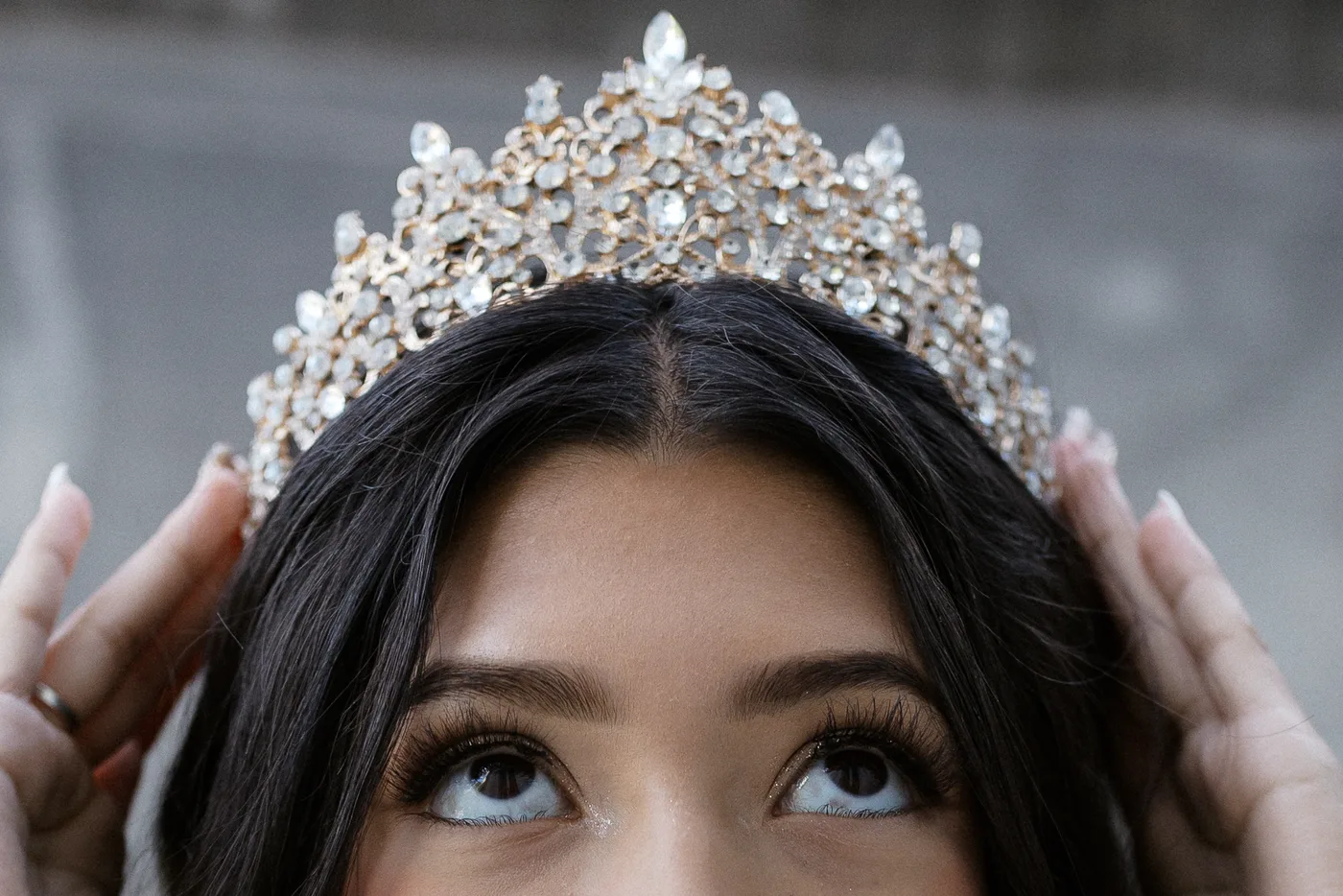 Celeste placing her tiara.